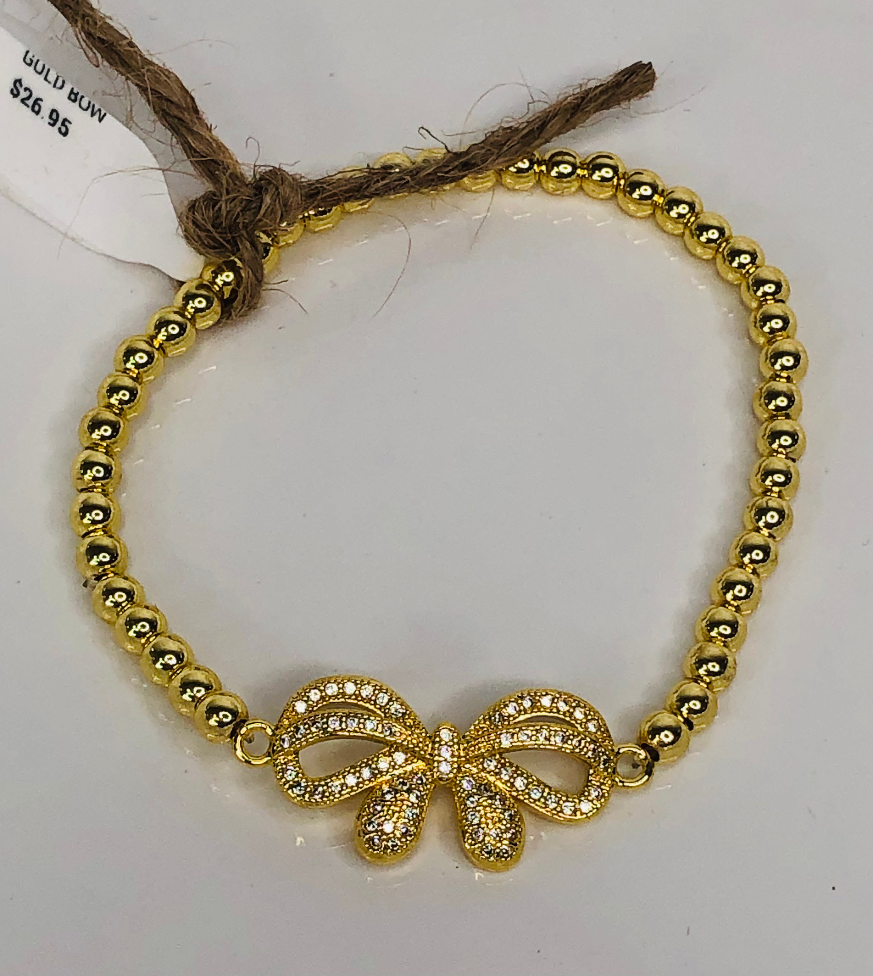 GOLD BOW BEADED BRACELET